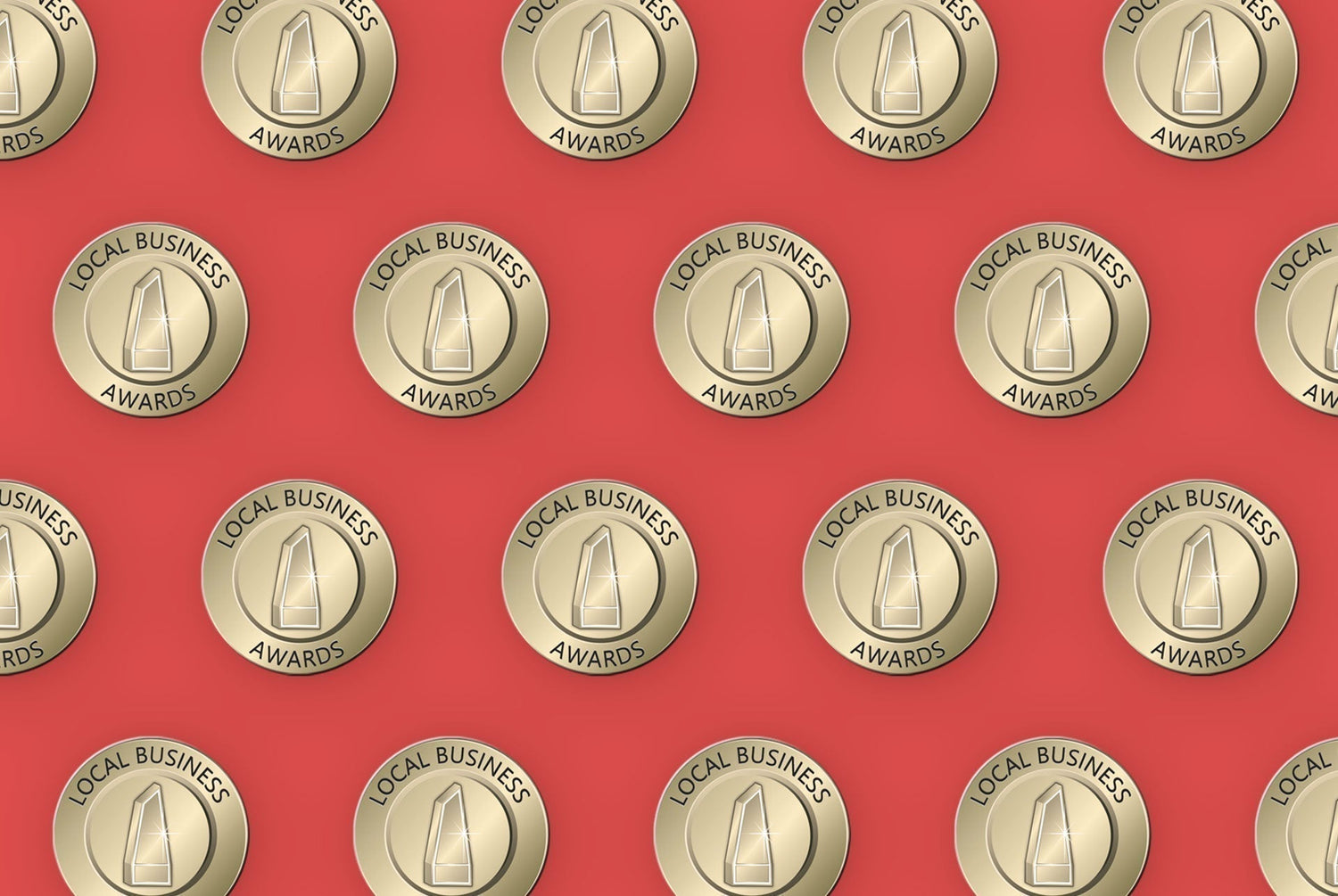 Gold circular metal badges engraved with local business awards and trophy icon featured at north west awards event