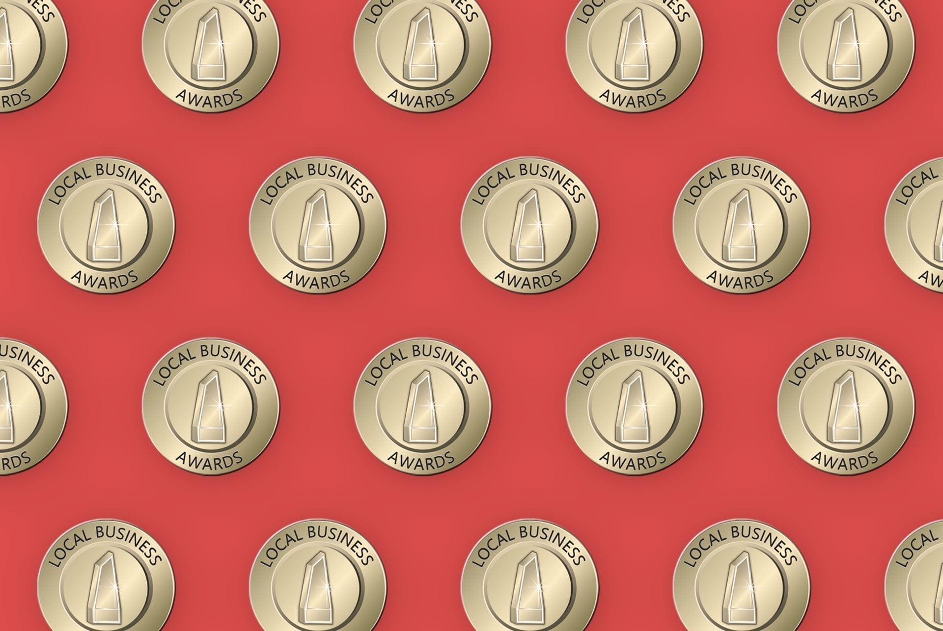 Gold circular metal badges engraved with local business awards and trophy icon featured at north west awards event