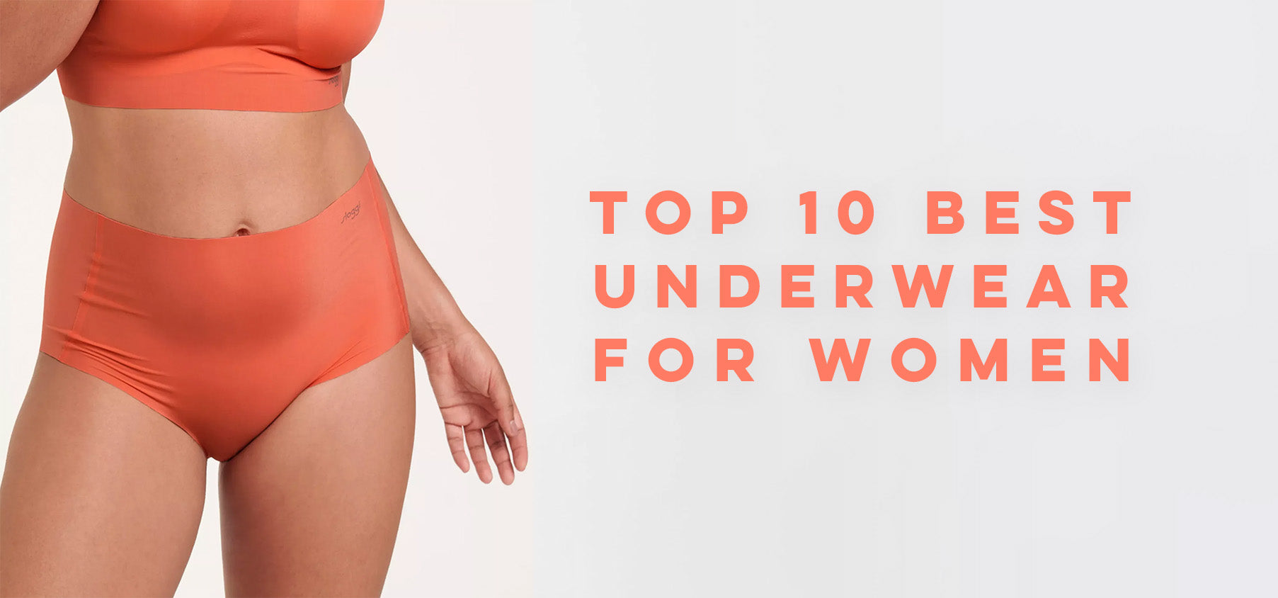 A pair of coral-colored high-waisted womens underwear made from smooth stretchy fabric for everyday comfort