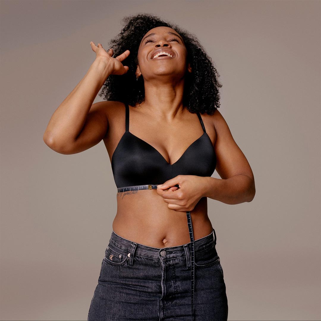 Black satin underwire bra with thin straps and smooth glossy finish from calvin klein collection