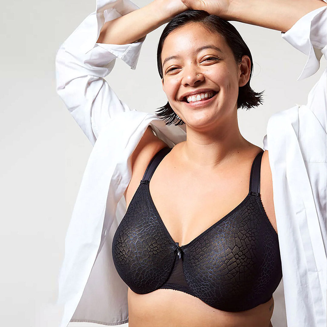 Black lace bra with subtle textured pattern and thin straps in the Chantelle collection