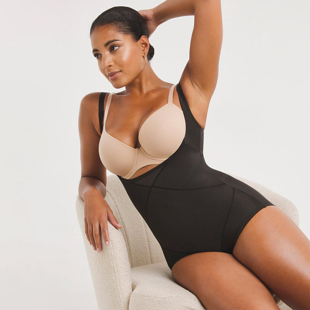 Black and beige two-tone bodycon shapewear with supportive bra cups from the miraclesuit collection