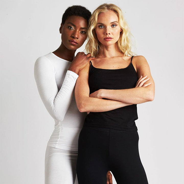 Black spaghetti strap tank top with square neckline paired with high waisted leggings from tani collection