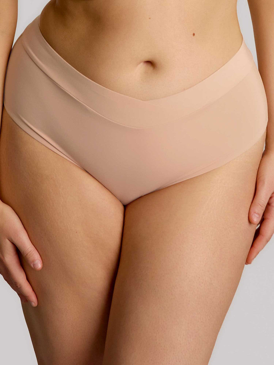Beige high-waisted seamless body deep brief with smooth stretchy fabric for comfortable all-day wear