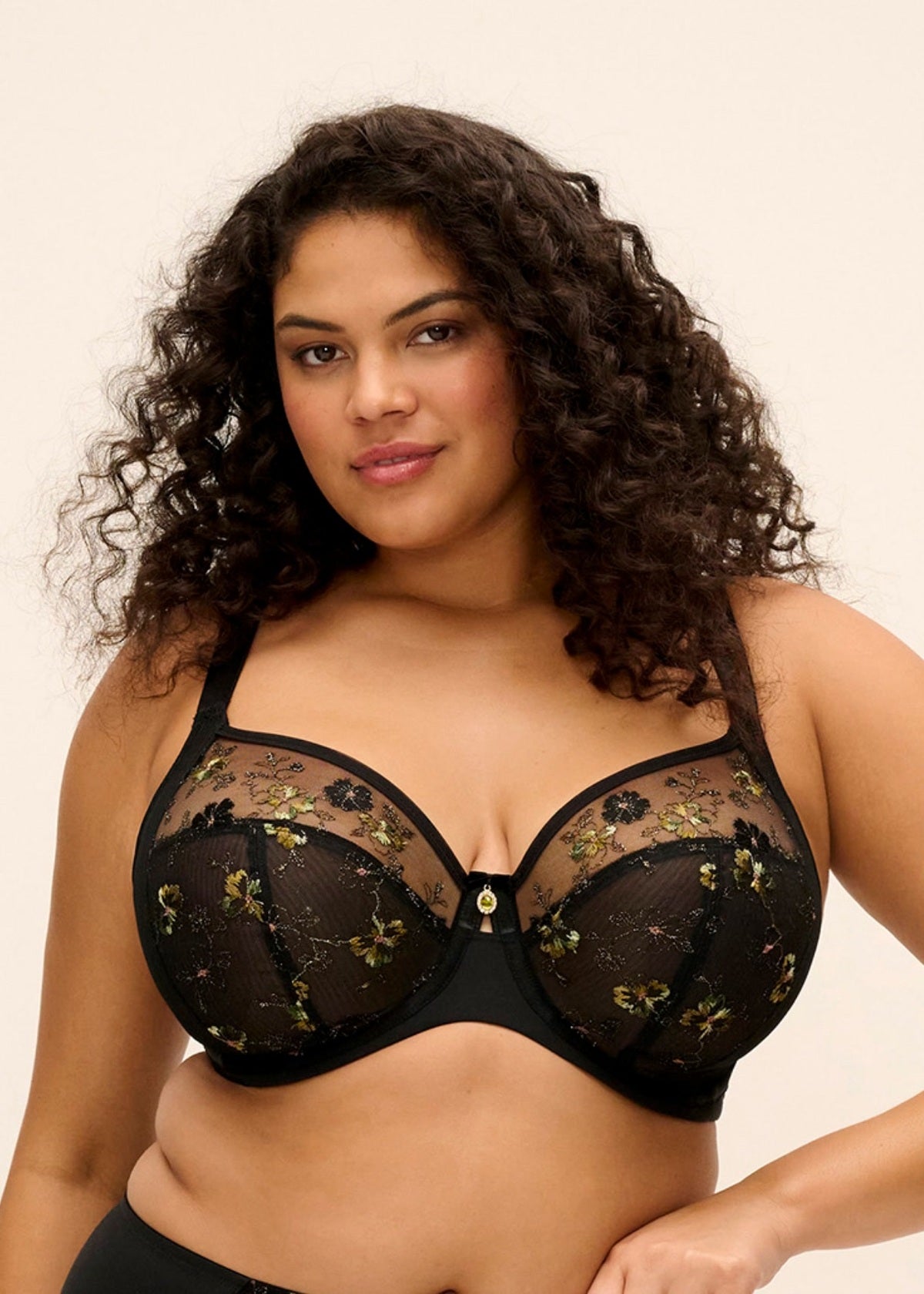 Black lace lyriana bra with gold and black floral embroidery showcasing elegant lingerie design