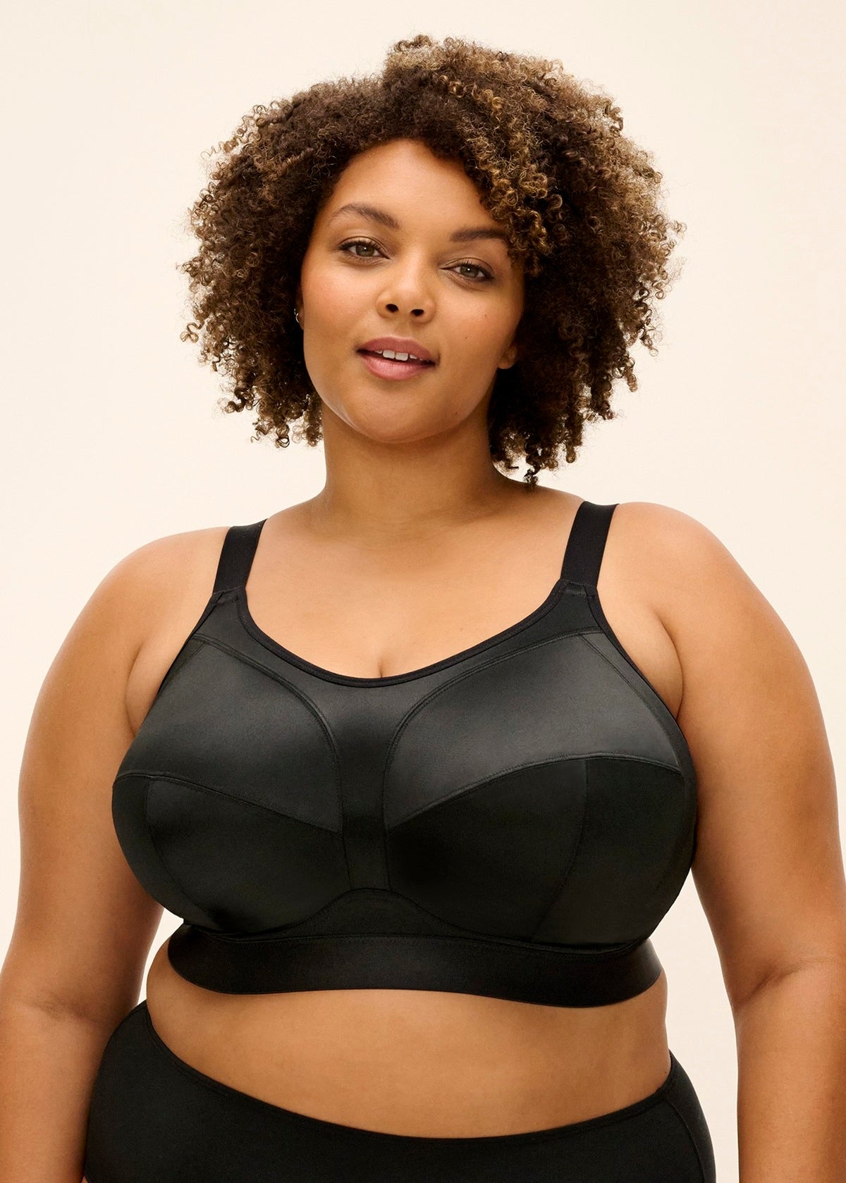 Black satin katarina non wired bra with supportive underwire and seamless design for comfortable sport use
