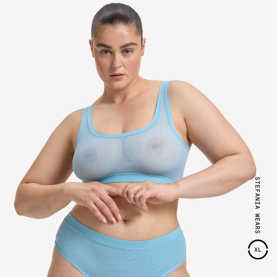 Light blue sheer mesh Everybody Scoop Crop sports bra and matching briefs