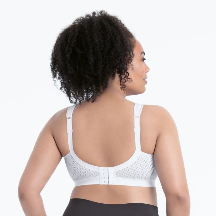 White Momentum supportive bra with breathable mesh panels and adjustable straps for comfortable all-day wear