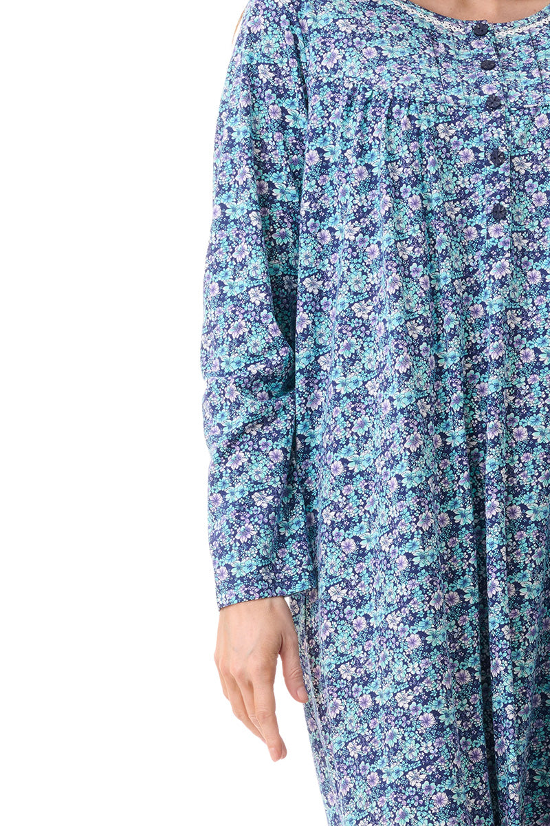 Jada mid nightie long-sleeved nightgown with soft blue and purple floral pattern made of lightweight fabric with gathered neckline