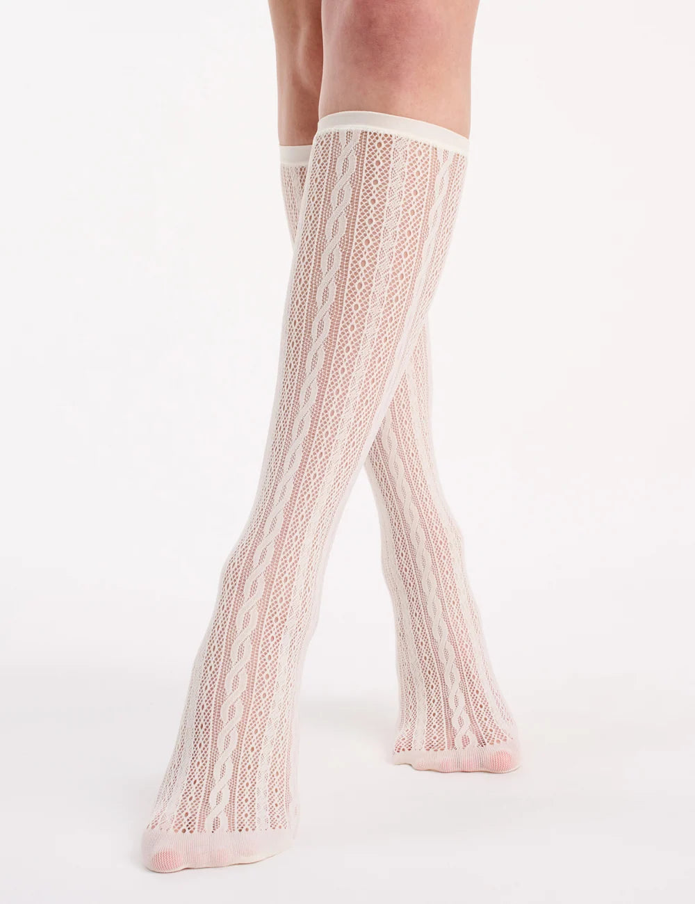 Cream-colored lace net knee high socks with cable-knit lace pattern sheer texture and ribbed cuffs