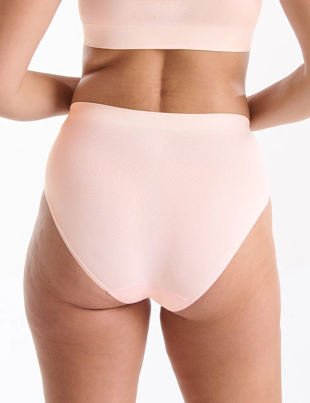 A soft blush pink high-waisted brief Bondi Bare hi cut with smooth seamless fabric finish