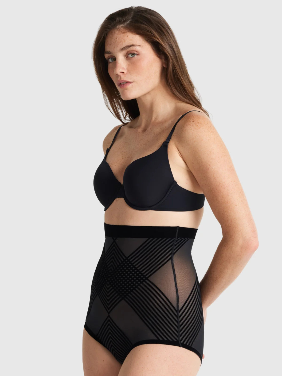 Black sheer high waist brief shapewear featuring geometric mesh panels for a smooth silhouette