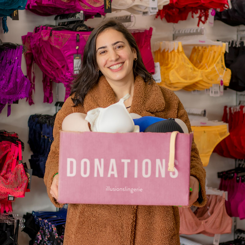 Melbourne Bra fitter holding bra donation box