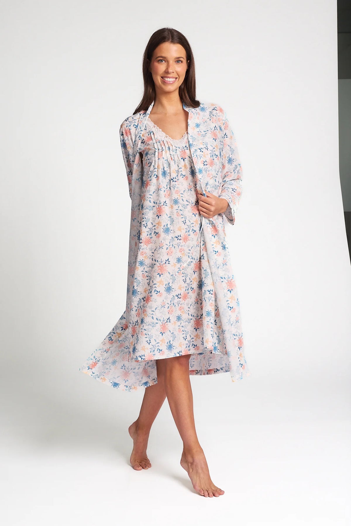 Cotton silk nightie soft light-colored floral nightgown with pink and blue blossoms on a pale background