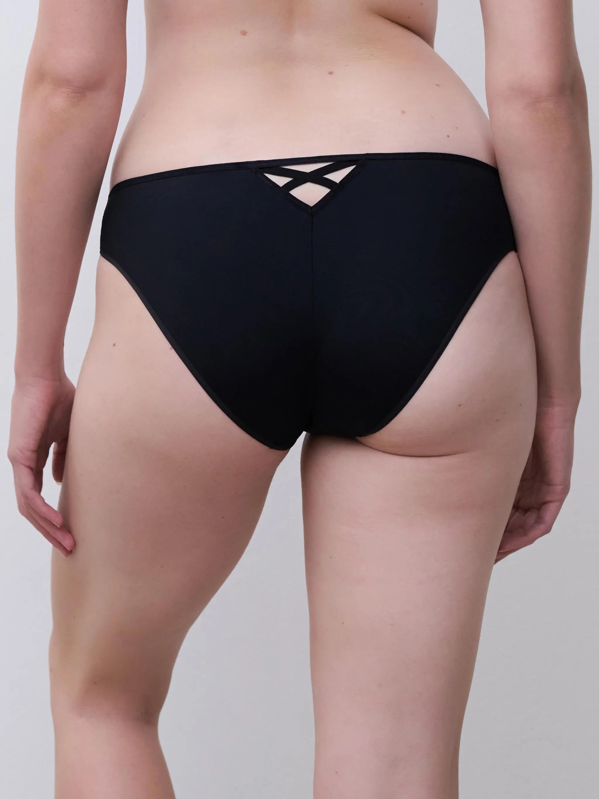 Black high-waisted lush brief bikini bottom showing back side with lace-up detail and adjustable straps