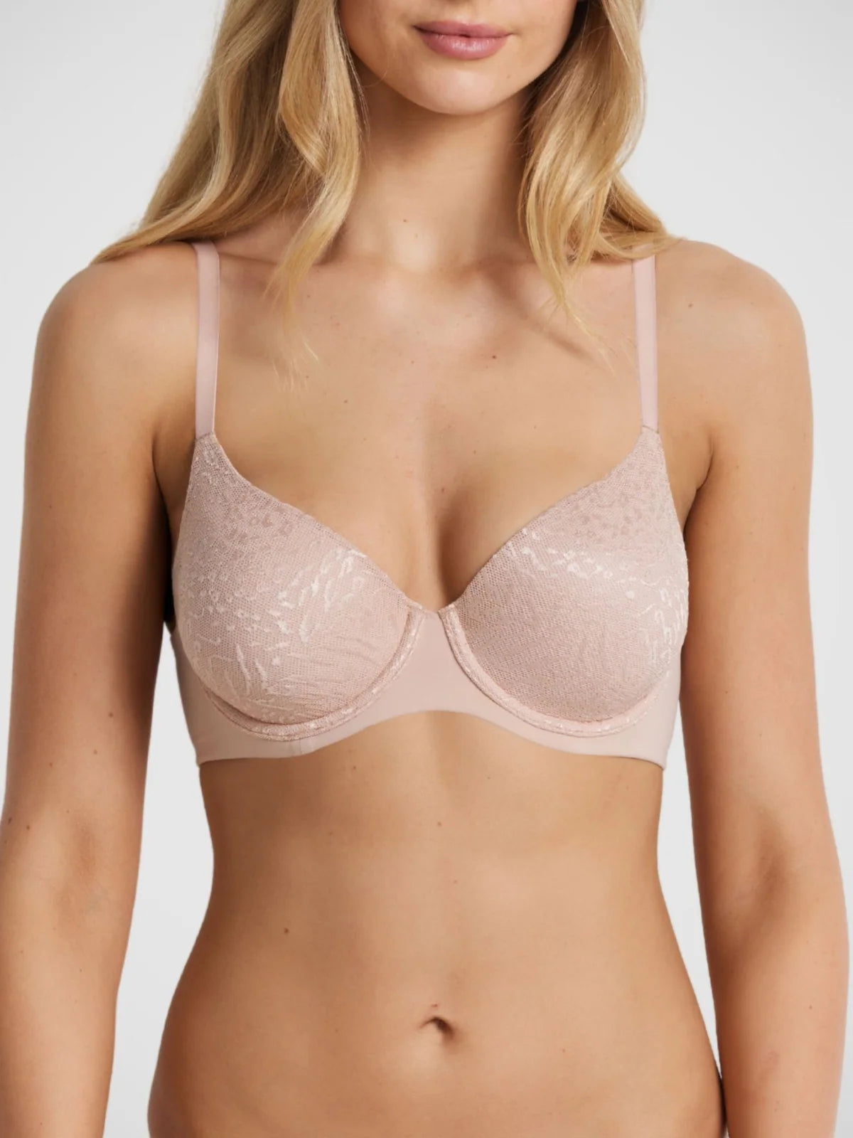 Delicate blush pink memory t shirt bra with lace underwire thin straps and seamless flattering design
