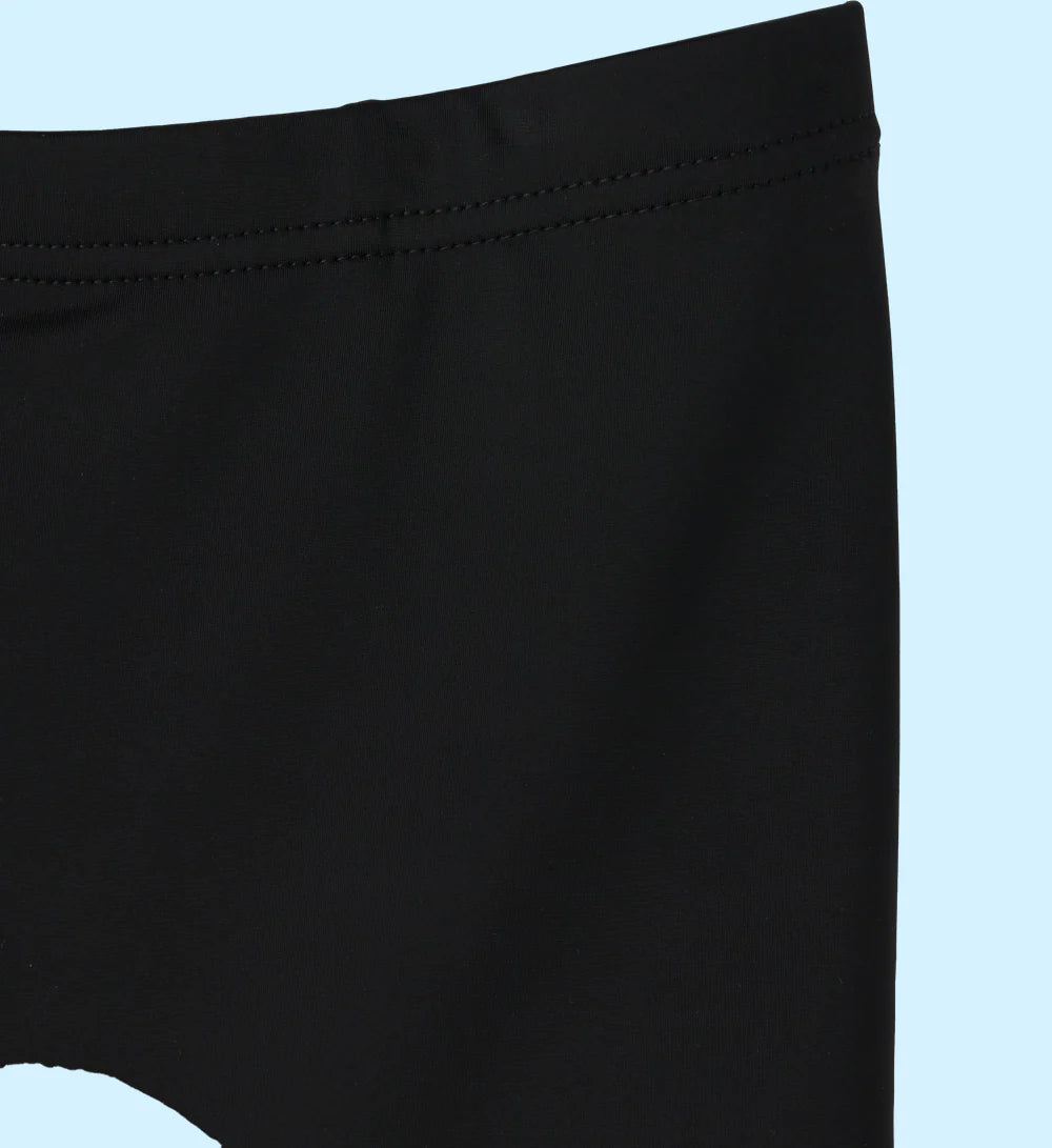 Serena No-Tuck Shorty black elastic waistband with fine stitching