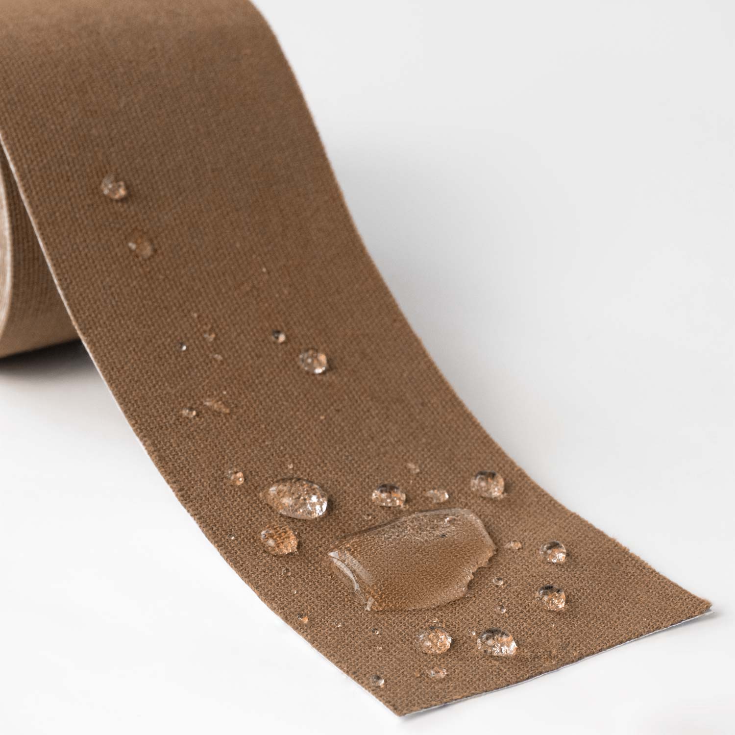 4-inch brown woven binding tape with water-repellent beading droplets