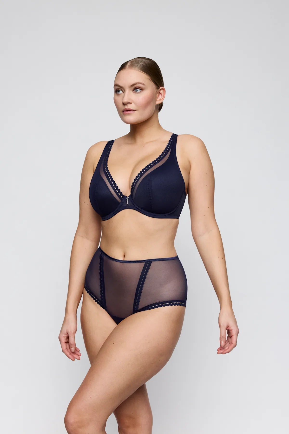 Navy blue wowgirl underwire bra with sheer mesh panels and lace trim showing front side details