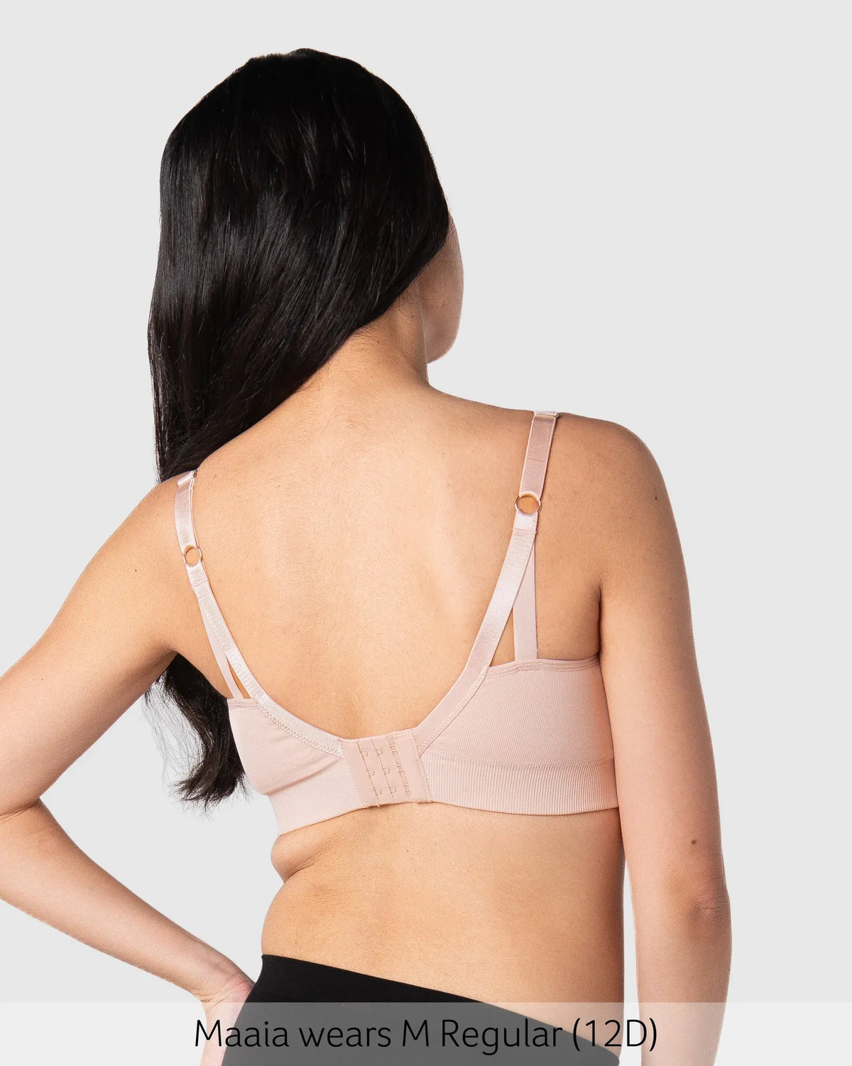 My Necessity seamless nursing bra in soft blush pink with delicate adjustable straps and supportive underwire design