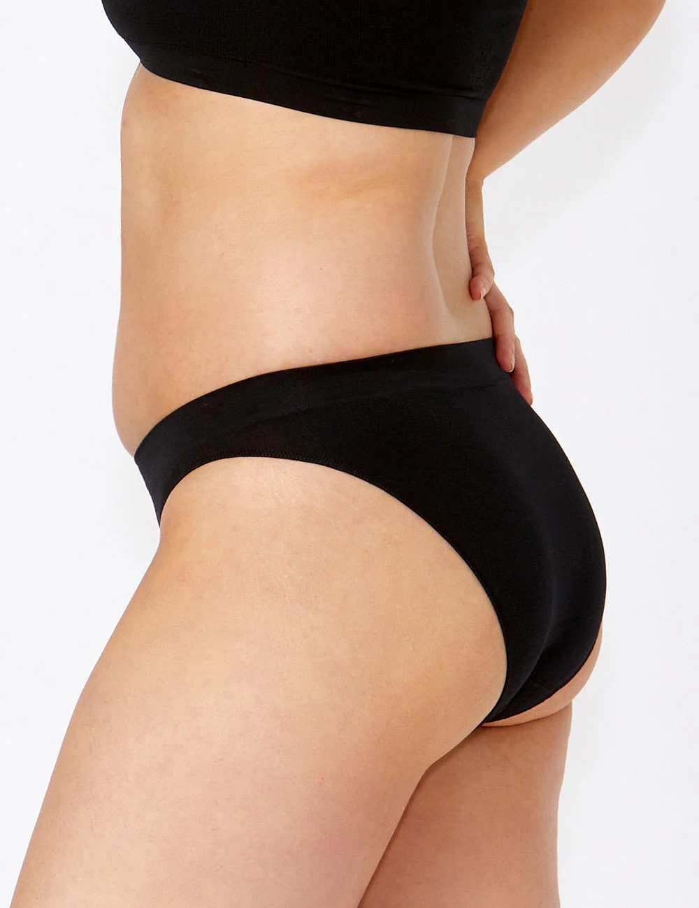 Bare Essentials Bikini: black seamless low-rise stretchy briefs
