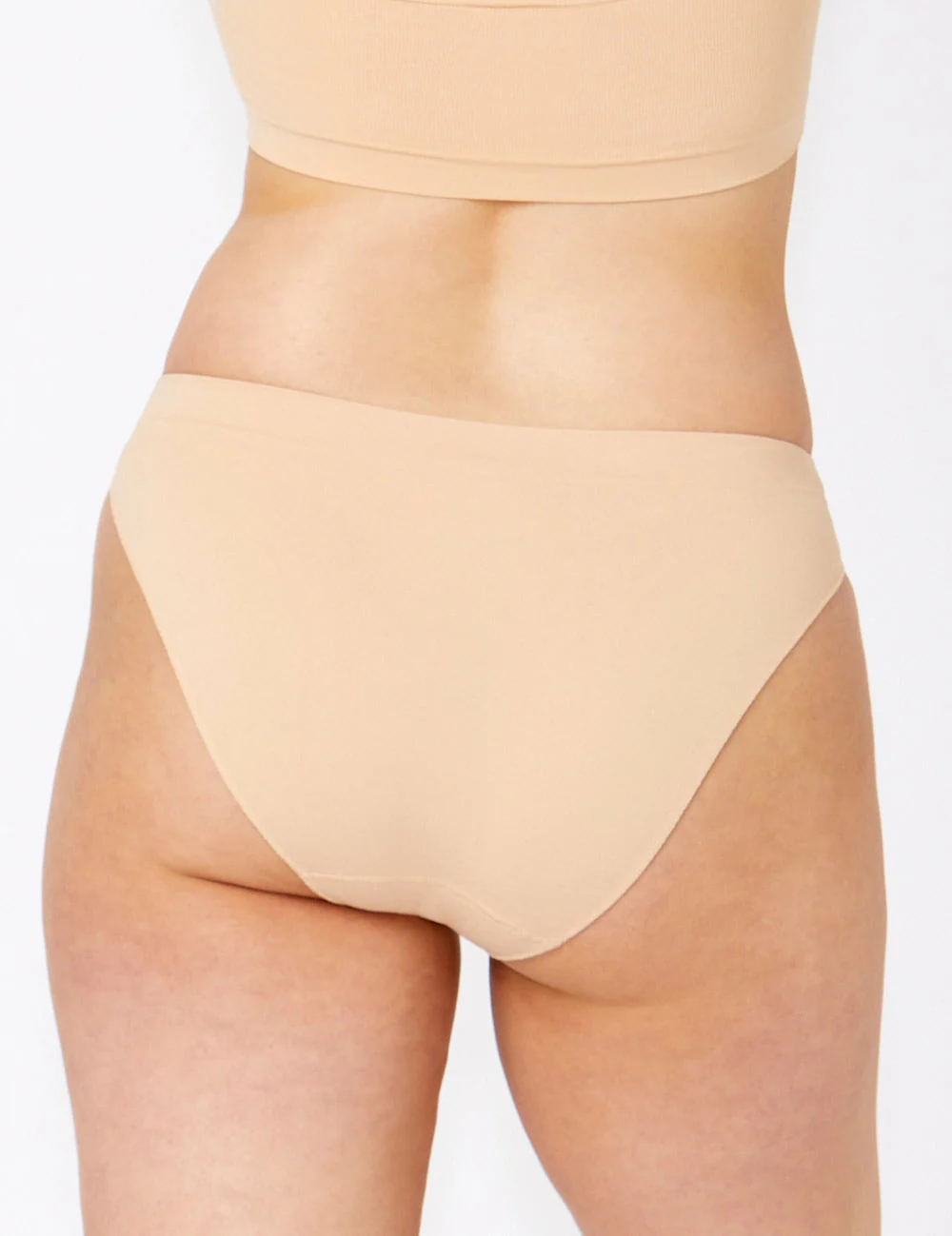 Beige high-waisted Bare Essentials Bikini bottom with seamless fabric