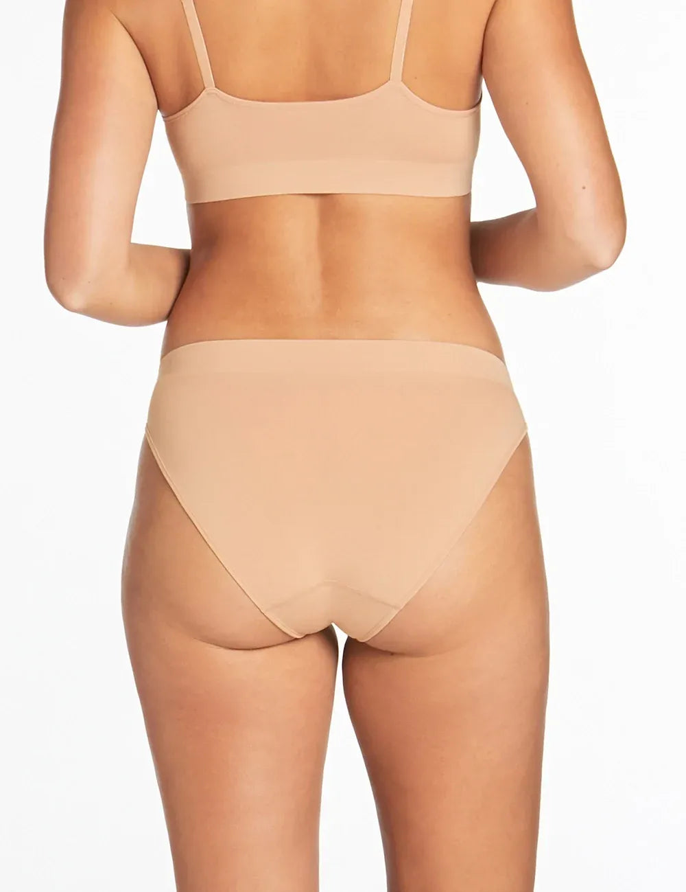 Beige seamless bra and matching high-waisted briefs set from purebasics bikini brief 2 pack for comfortable everyday wear