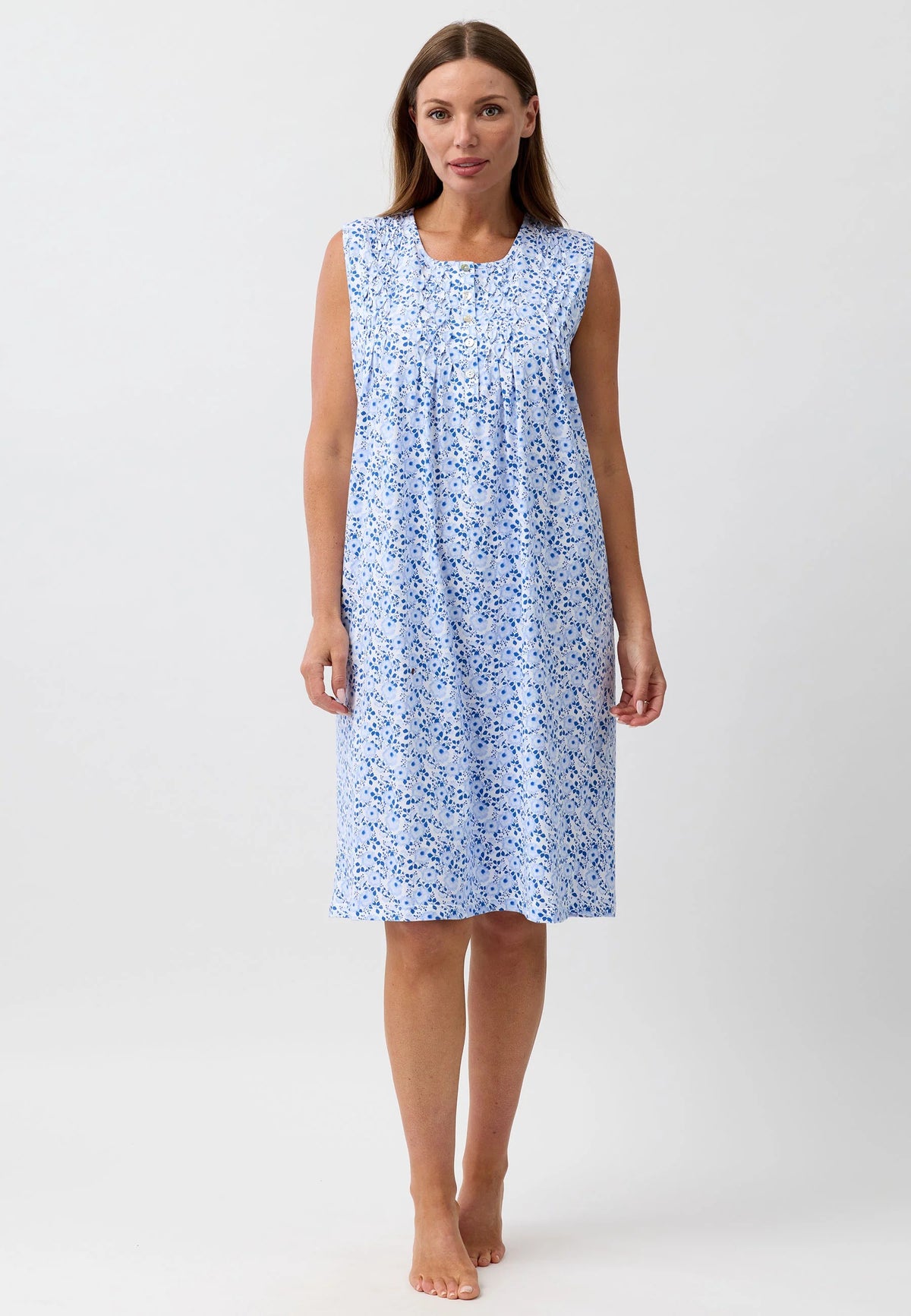 A light blue sleeveless camellia nightie with floral print gathered neckline and soft flowing fabric for comfort