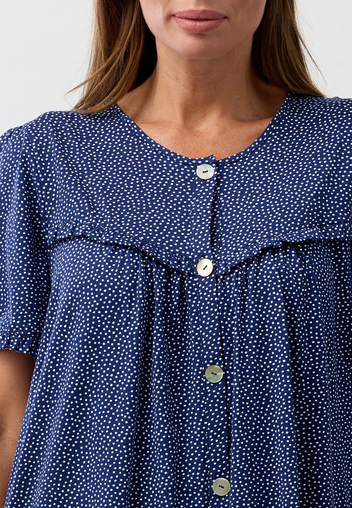 Confetti brunch coat navy blue blouse with delicate white polka dots rounded neckline and short puffed sleeves