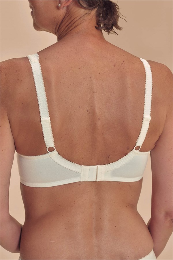 Floria Wire-Free Bra in white lace with trim, adjustable straps, central clasp