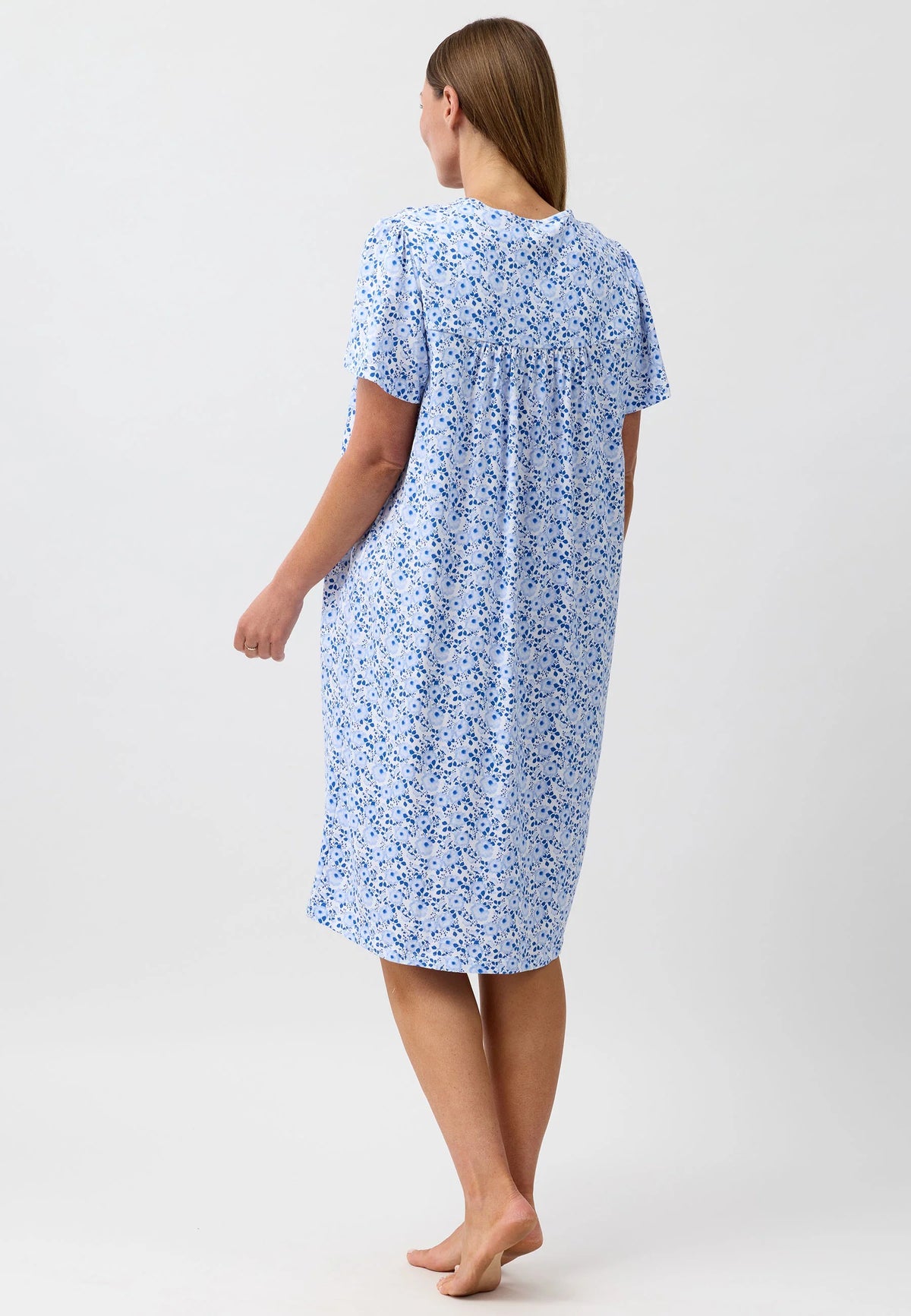 A light blue camellia short sleeve nightie with a delicate floral pattern and relaxed fit for comfortable sleepwear