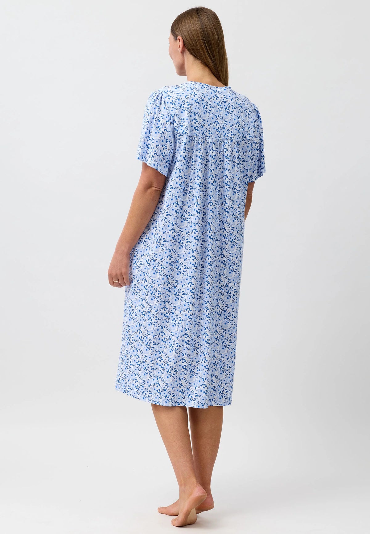 Light blue camellia brunch coat nightgown with a delicate floral pattern short sleeves and relaxed fit