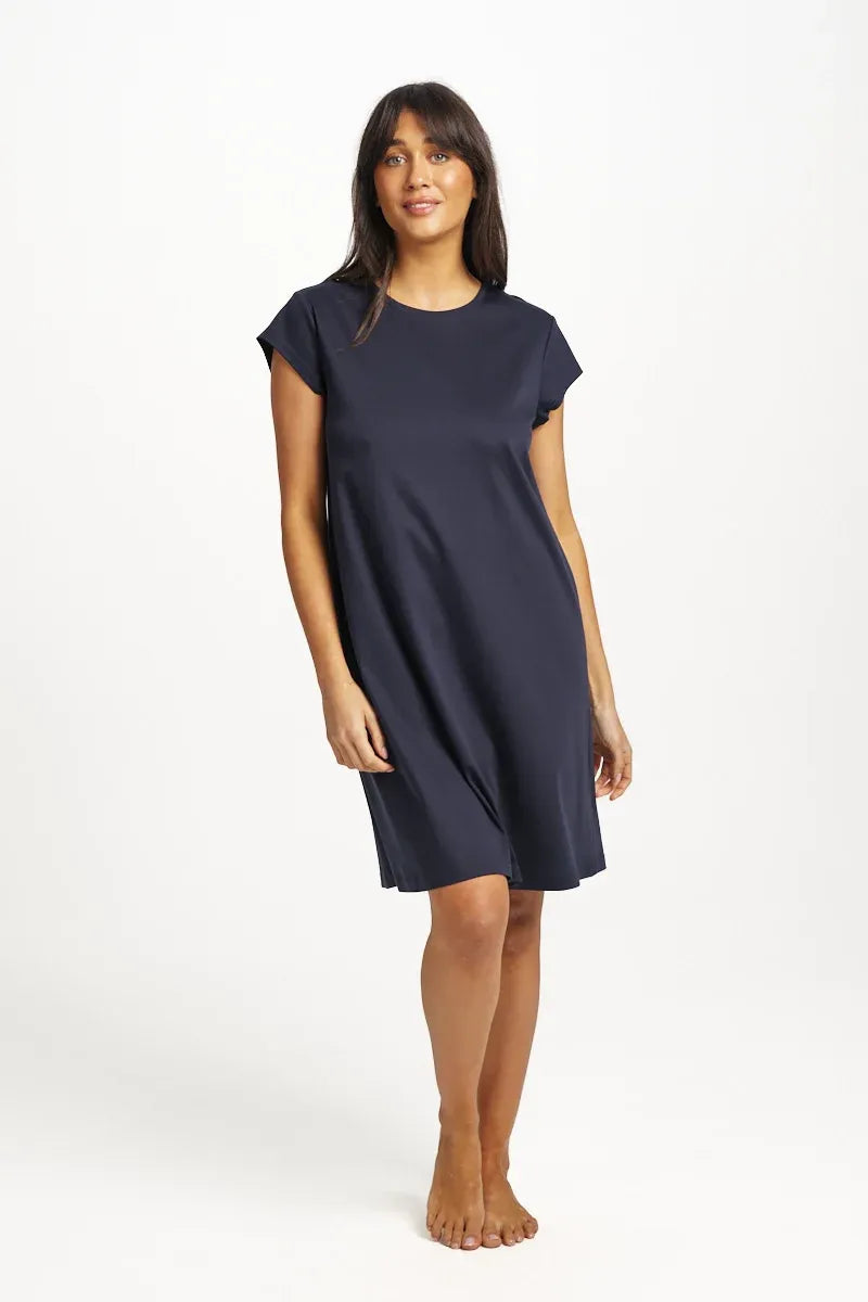 A navy blue supima cotton cap sleeve nightie with a loose fit and simple round neckline in an a-line silhouette