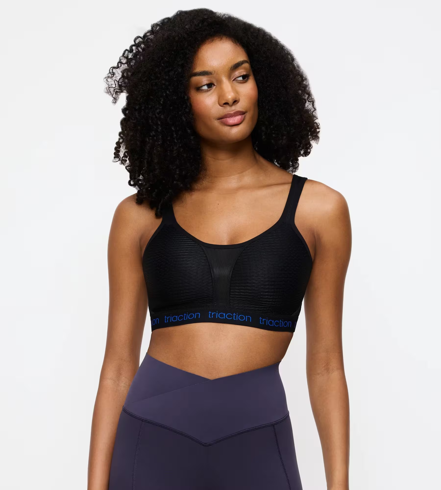 Black Triaction Energy Lite P EX sports bra with ribbed texture and blue traction band