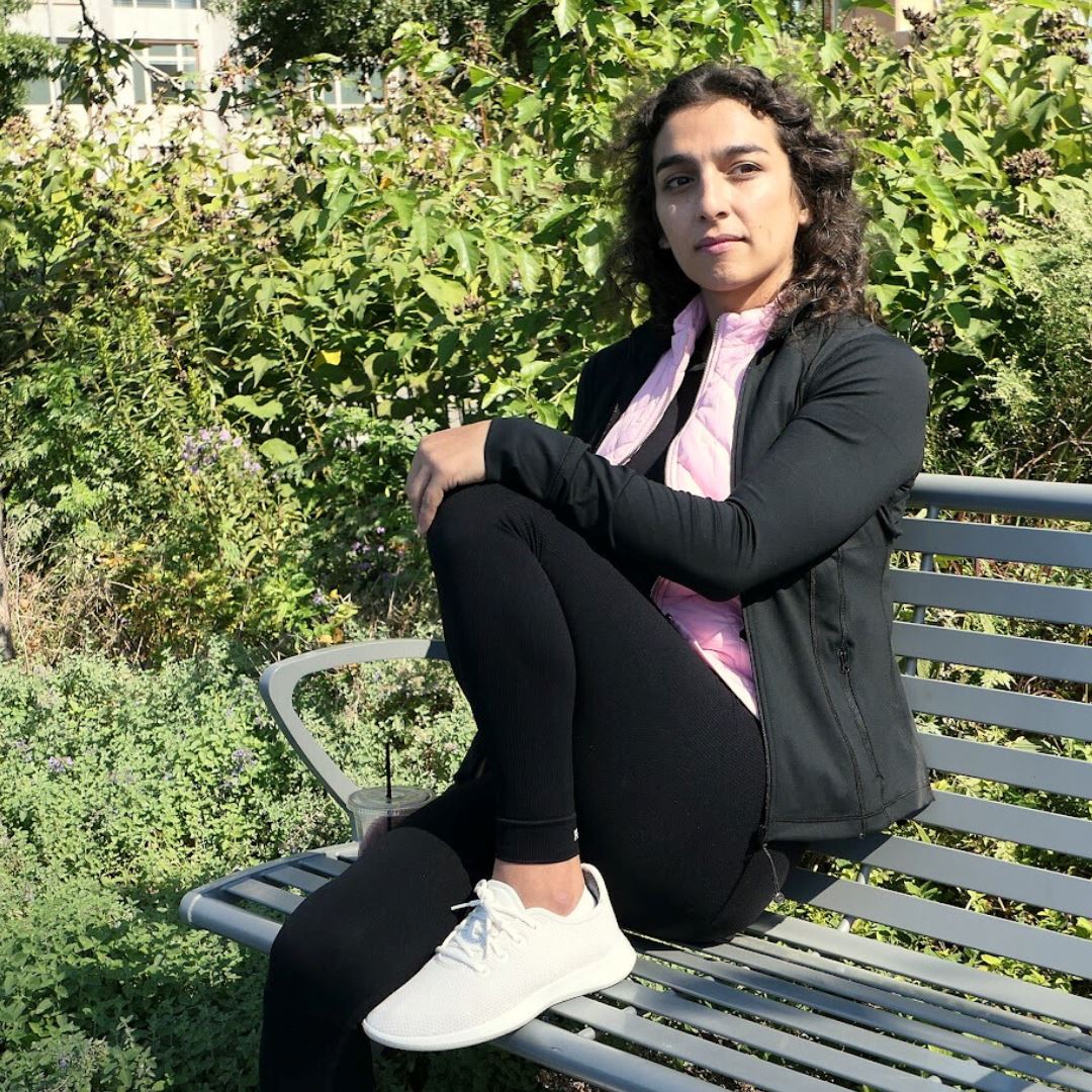 Black and pink quilted athletic jacket over black top with FEMME Pocket Leggings