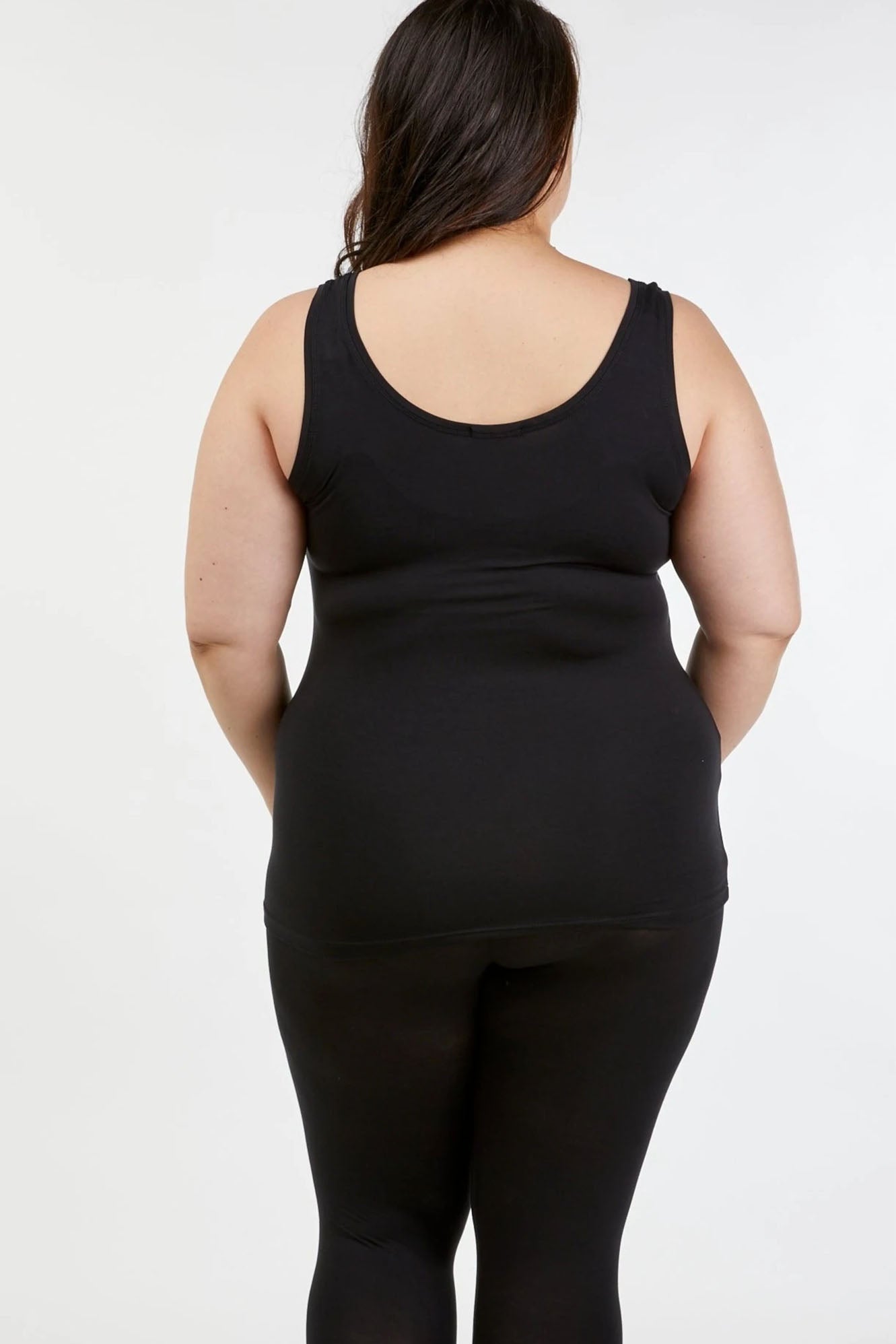 Woman wearing black Tani Scoop Tank 79246 back view