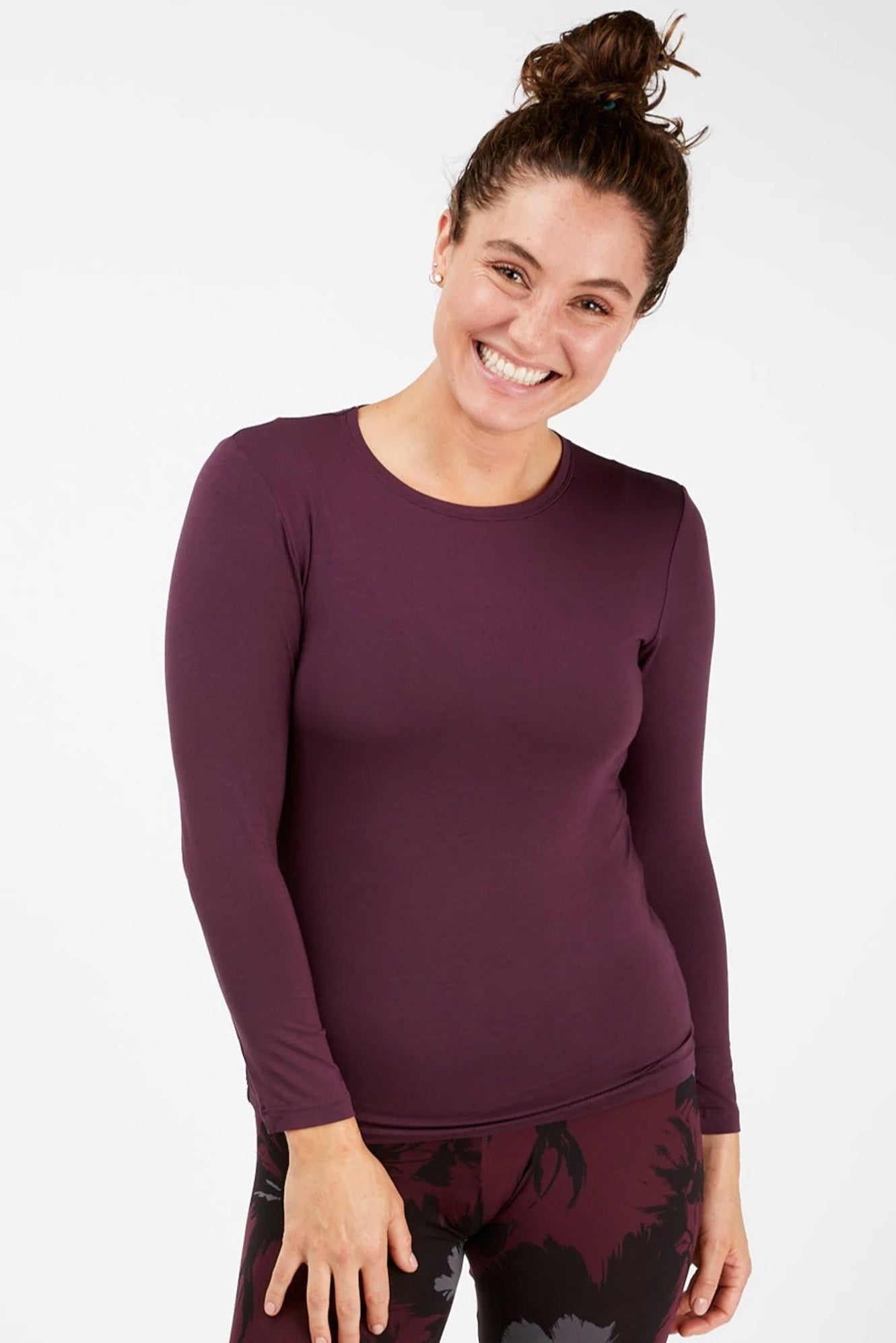 Young woman wearing Tani 79276 High Neck Long Sleeve in Wine Tasting