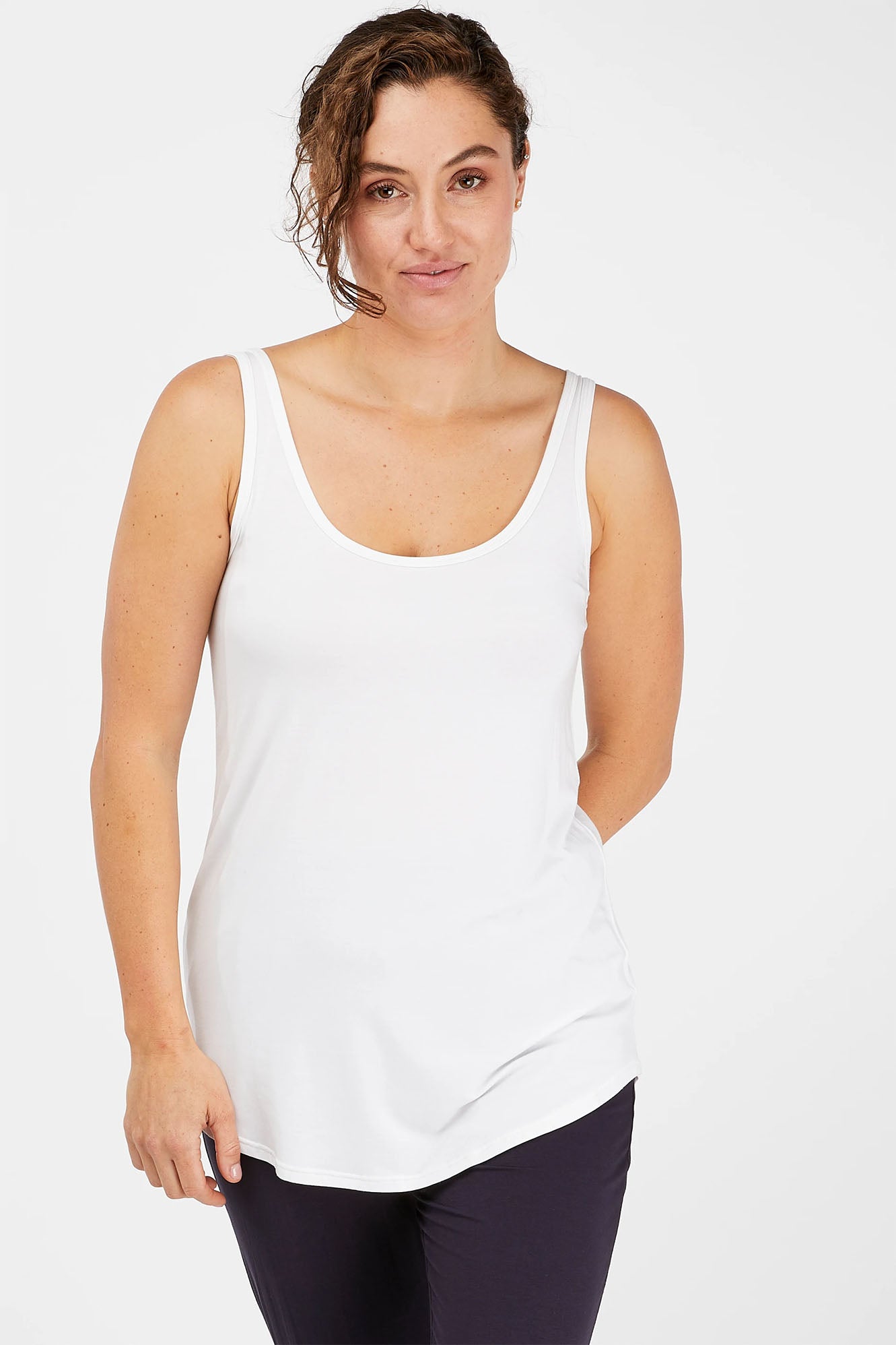 Woman wearing white Tani Tank 79752