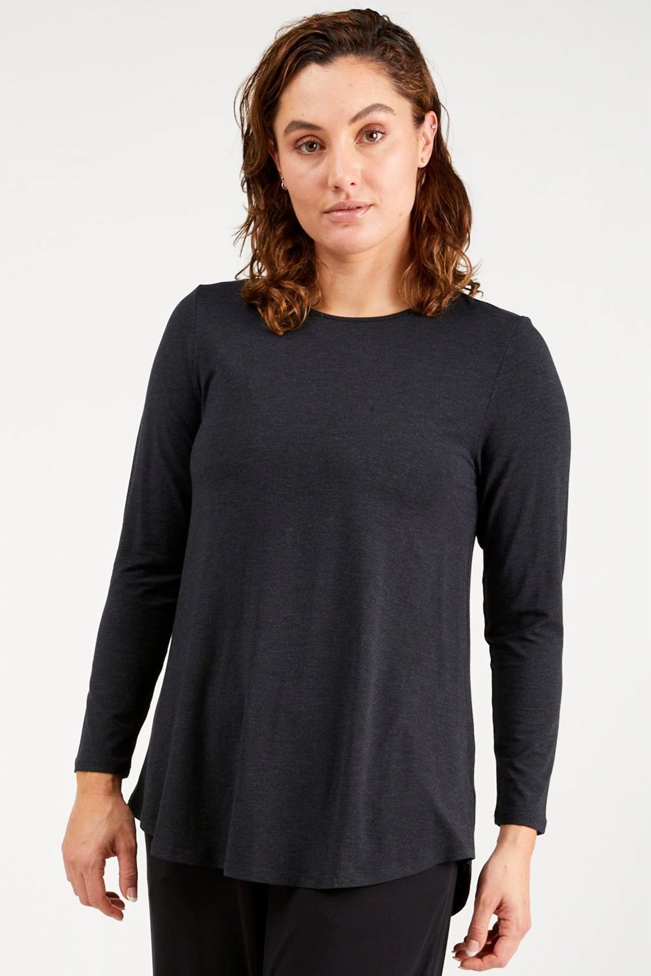 Young woman wearing Tani 79767 Cara Long Sleeve in Graphite