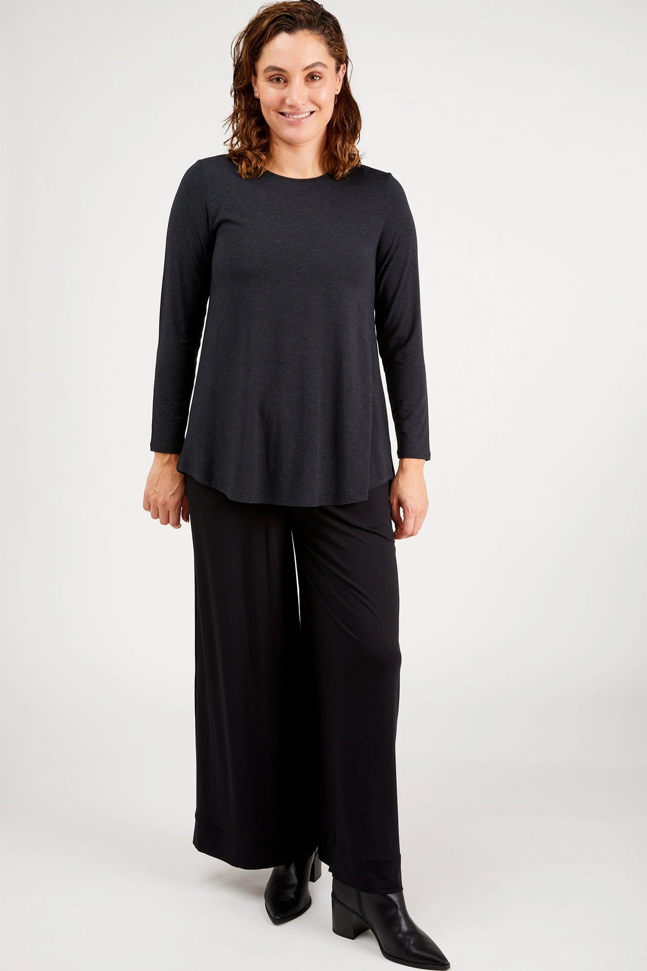 Young woman wearing Tani 79767 Cara Long Sleeve in Graphite full view