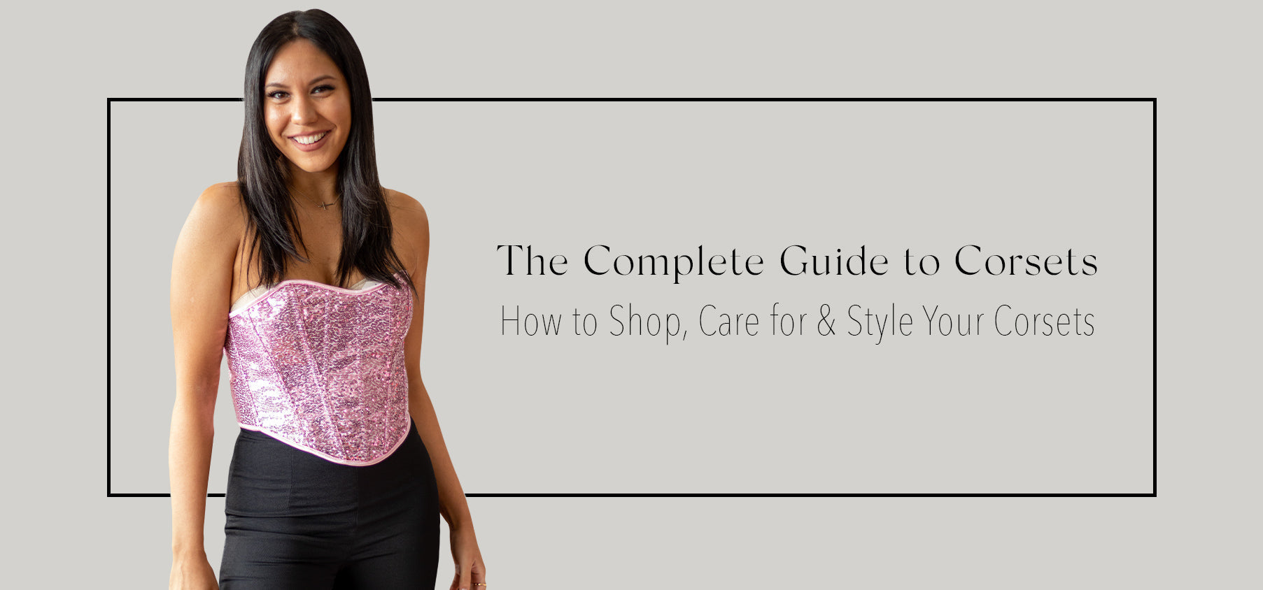 Woman wearing a pink corset on a grey background with text that says The Complete Guide to Corsets, How to Shop, Care for & Style Your Corsets