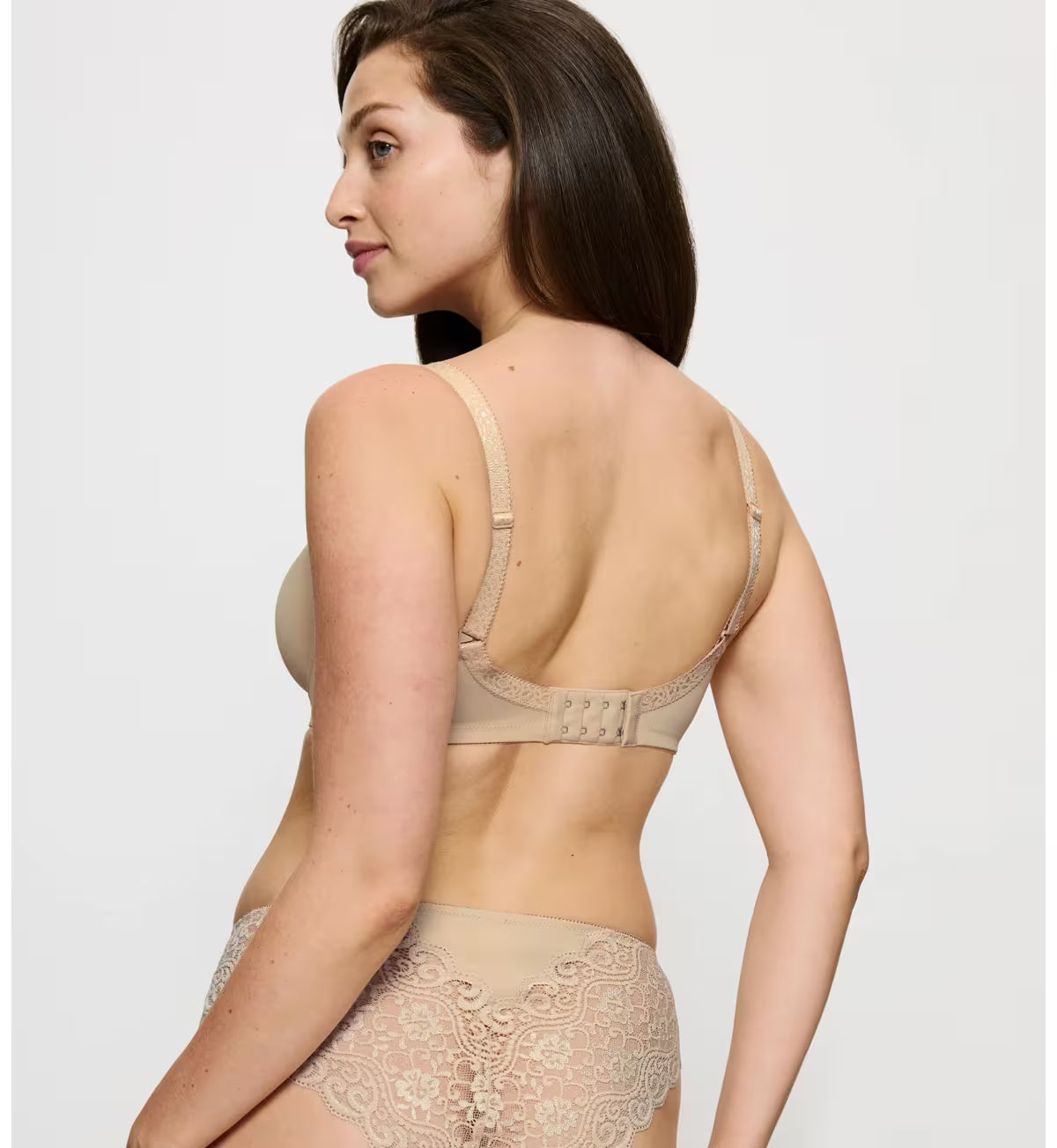 Beige Amourette W01 seamless bra with lace trim and adjustable straps paired with matching lace panty