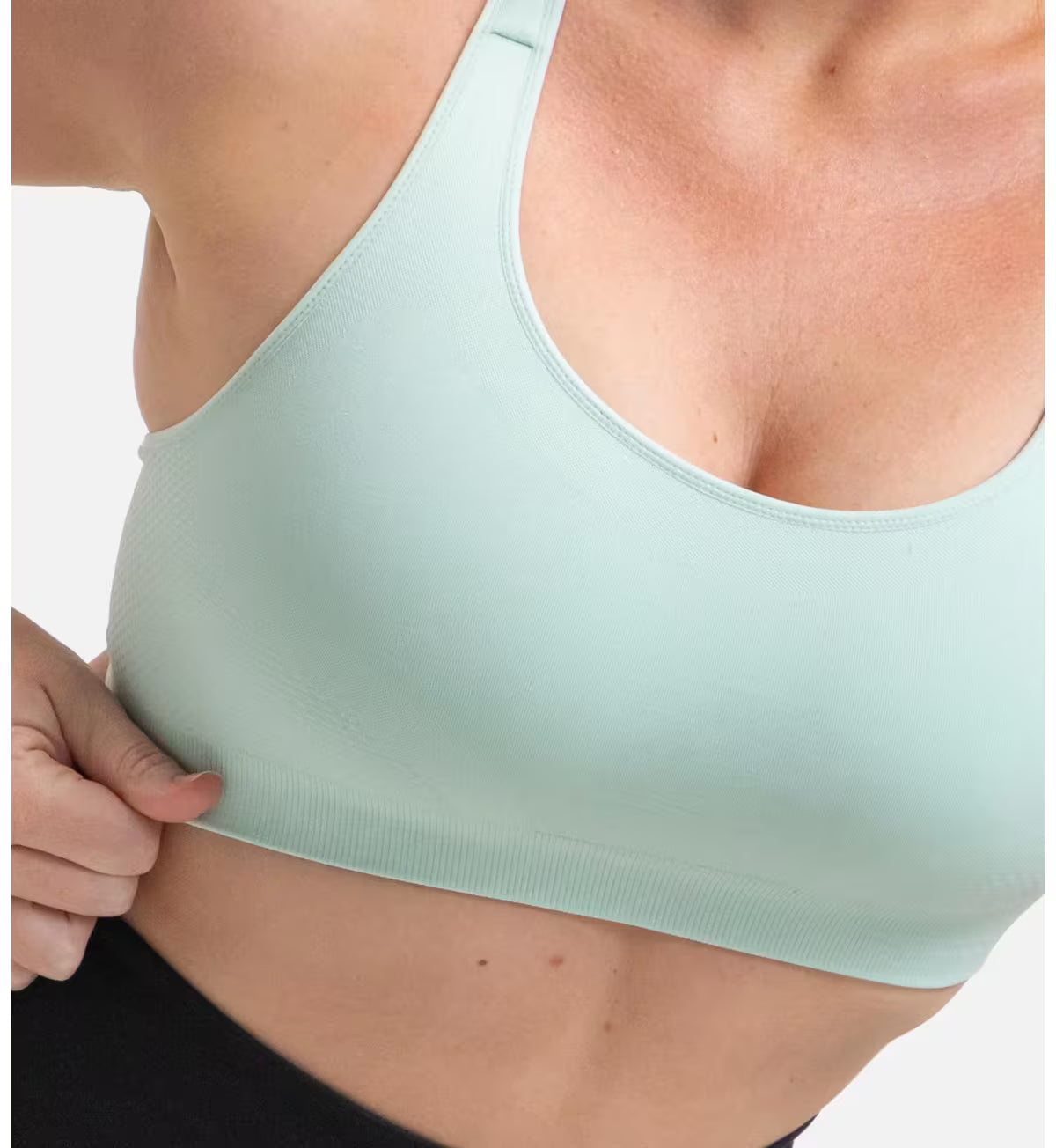 Triaction ultra seamfree top light mint green seamless sports bra with thin straps and smooth stretchy fabric