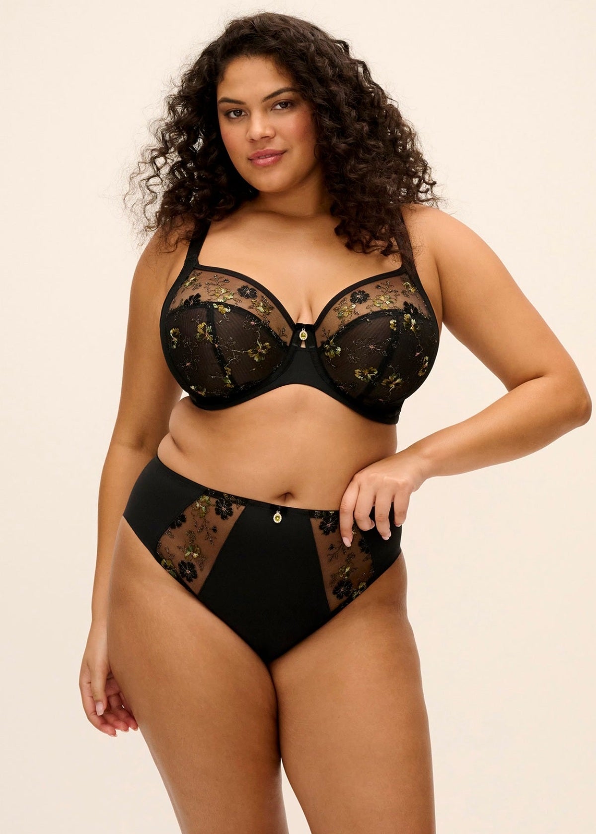 Black lace lyriana brief bra and high-waisted panties with floral embroidery in front view
