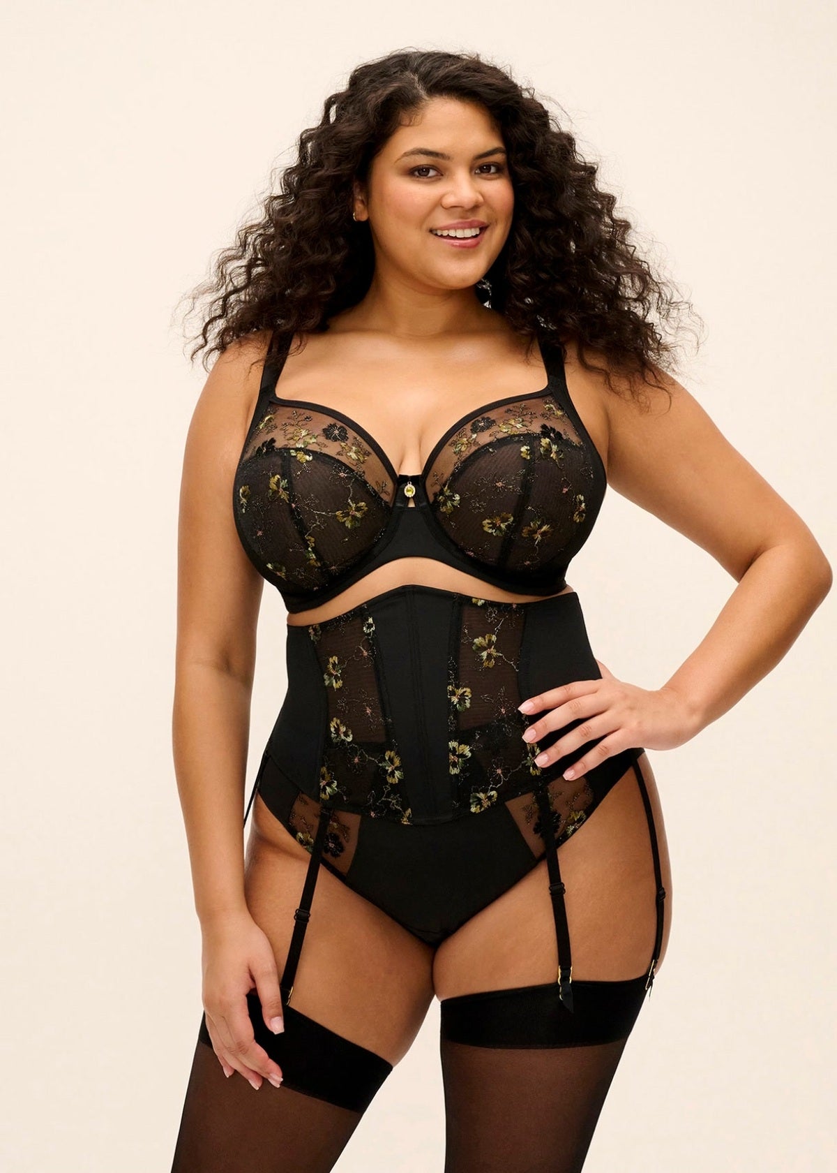 Black lace lyriana suspender bodysuit with floral embroidery and adjustable straps for elegant lingerie wear