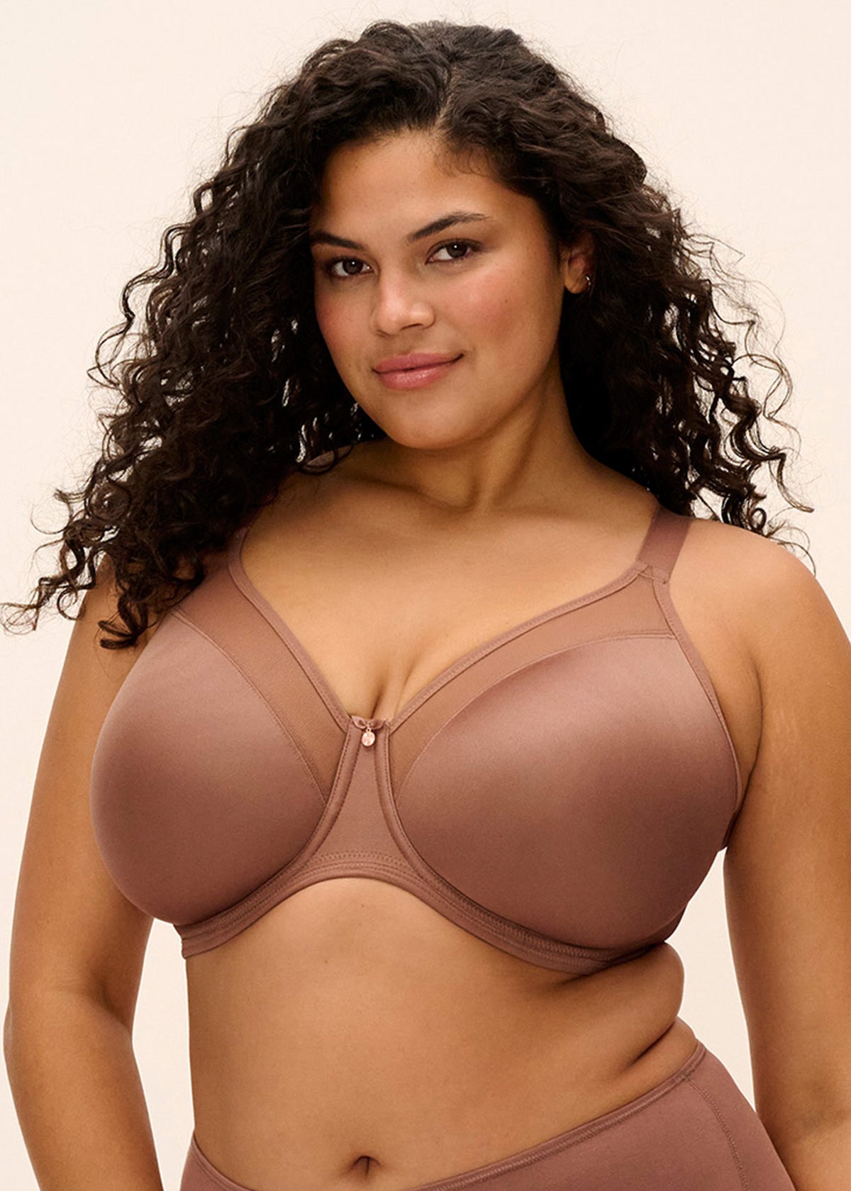 Smooth taupe seamless underwire bra with center front clasp and thin straps for comfortable everyday wear