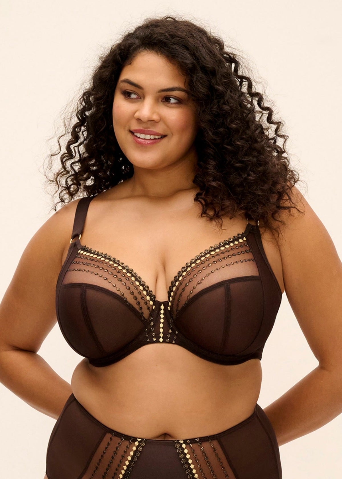 Black lace bra matilda with gold bead detailing and sheer mesh panels for elegant lingerie wear
