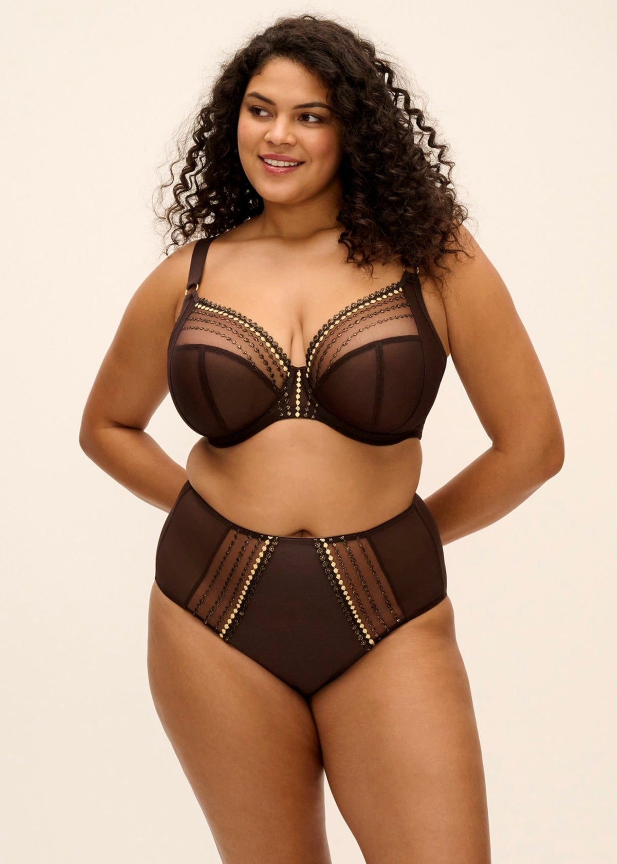 Black lace and mesh bra with gold tone embellishments in the matilda full brief collection
