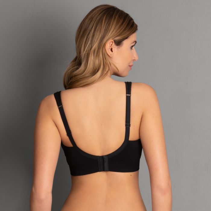 Black lotta post mastectomy bra with underwire adjustable straps and seamless back design shown from the back