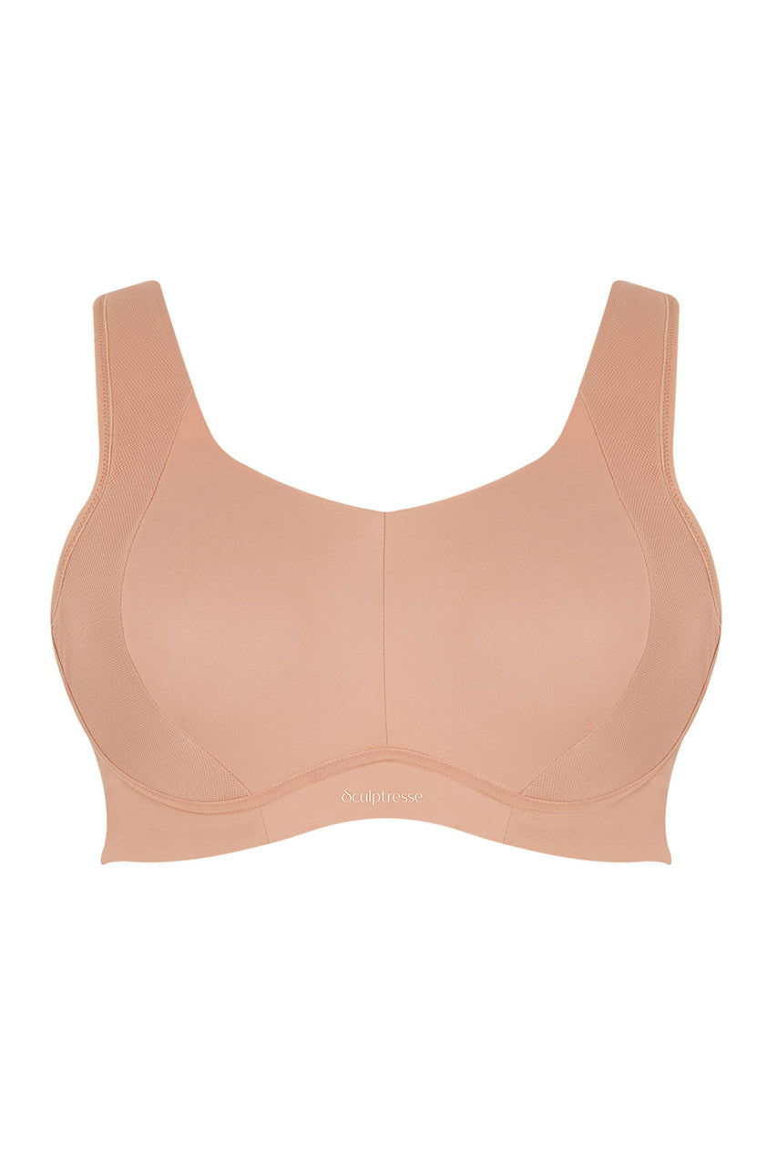Beige Thrive wired sports bra with supportive structured cups and subtle textured seamless fabric for active wear